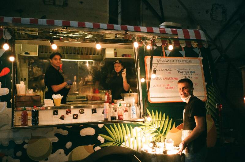 Photo of the staff in front the food truck