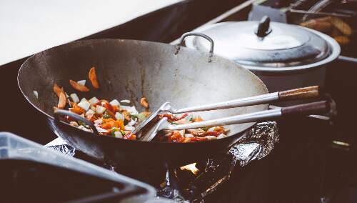 Mixture of vegetables being cooked in a wok